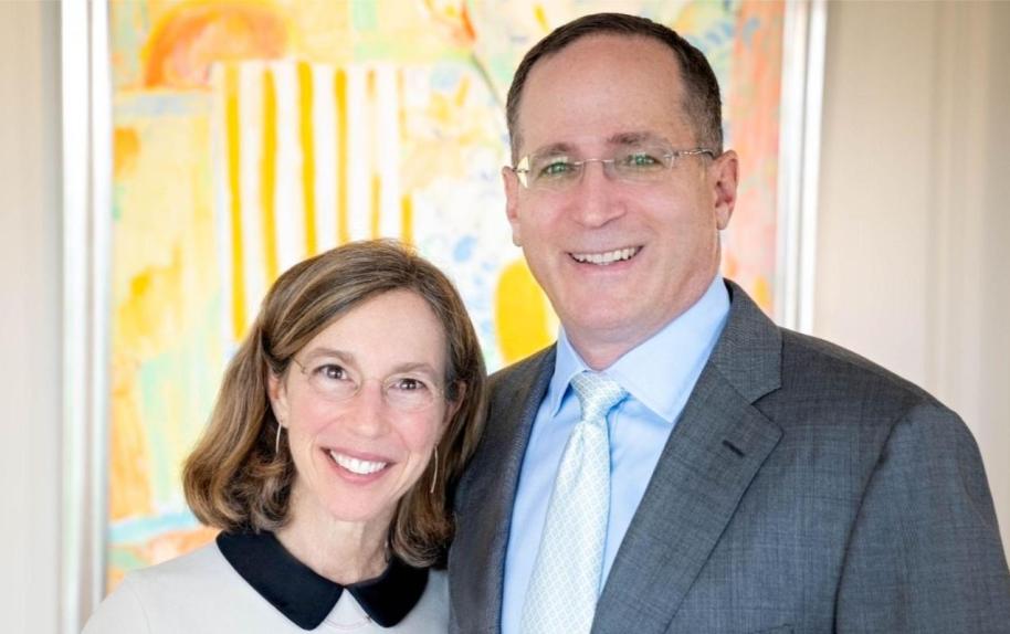 Jeannie and Jonathan Lavine pictured together, with one arm around the other